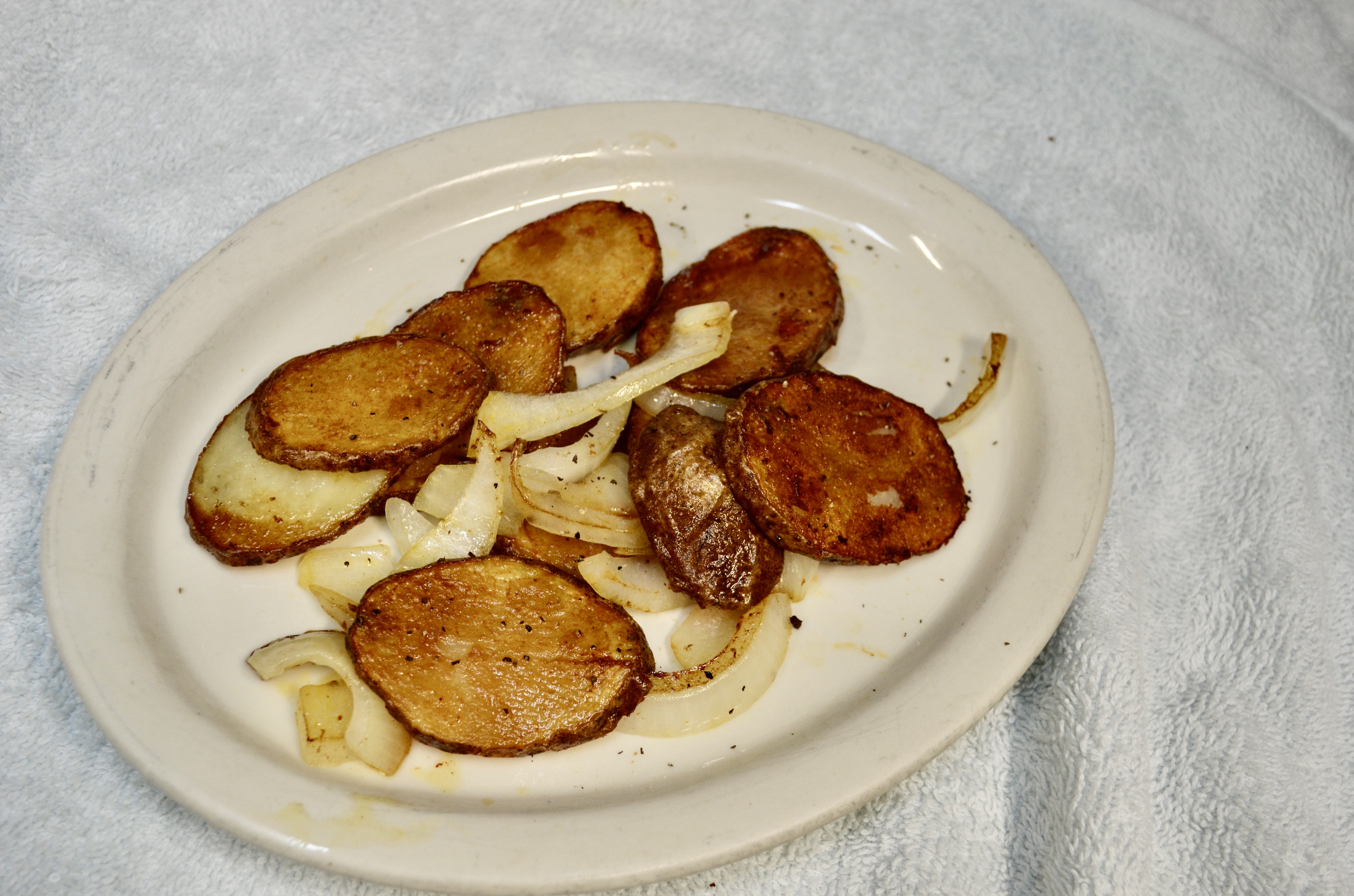 Order Papas Grilled Potatoes and Sauteed Onions food online from El Amigo store, Golden on bringmethat.com