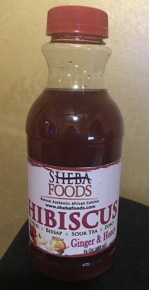 Order Hibiscus Drink - Ginger & Honey food online from Flavors Of Africa store, Lilburn on bringmethat.com