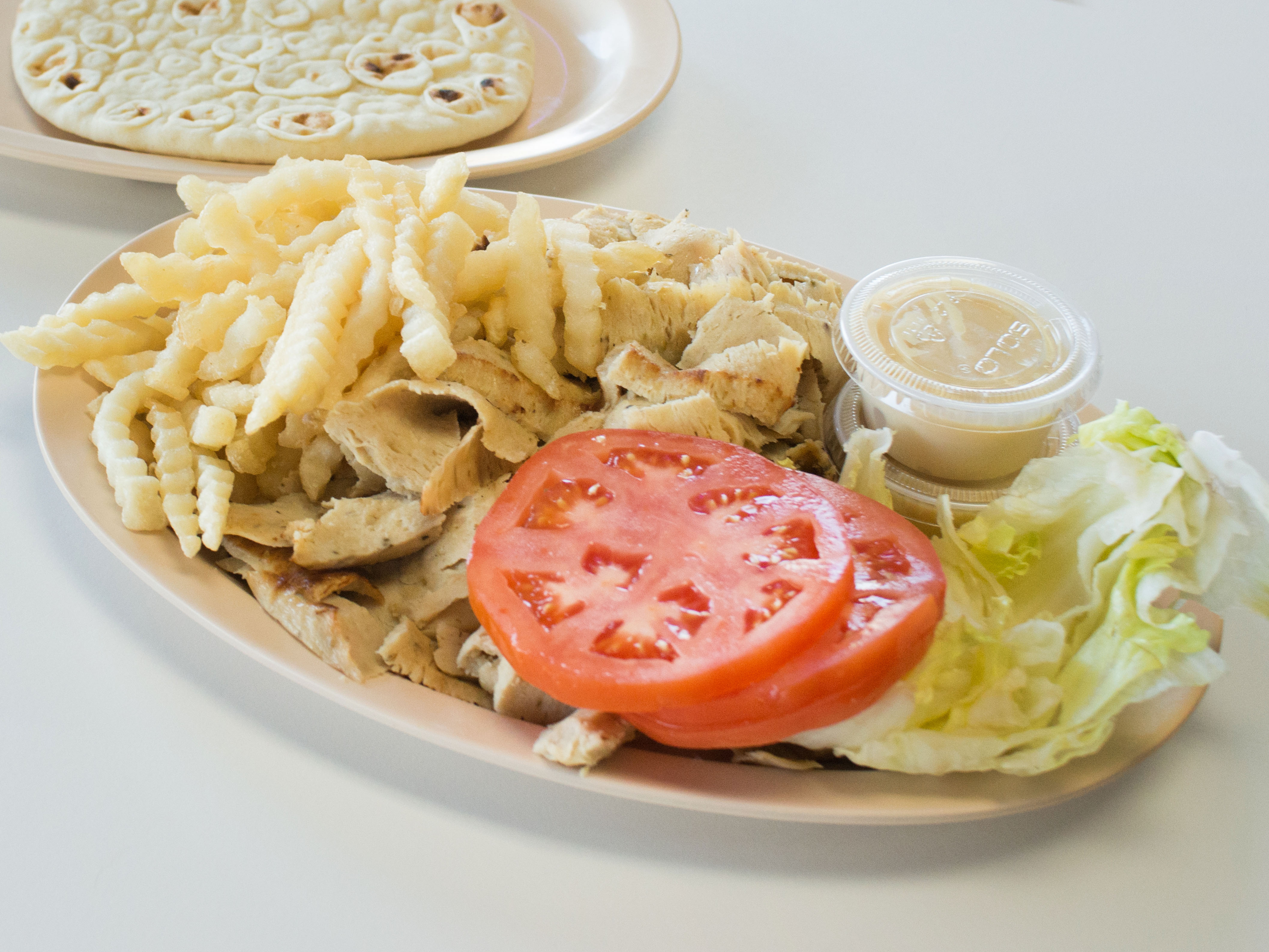 Order Chicken Gyros with French Fries food online from Chiggy Gyros store, Palatine on bringmethat.com
