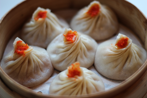 Order C12. Mini Juicy Buns with Pork and Crabmeat food online from Dumpling Palace store, Boston on bringmethat.com