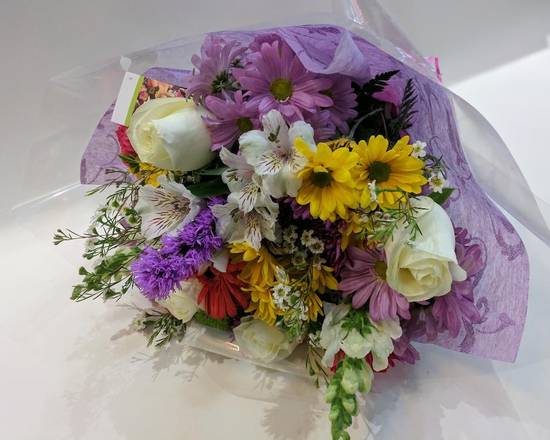 Order Wrapped Mixed Flowers Bouquet food online from Eugenia Flowers 24/7 Flower Shop store, Oak Park on bringmethat.com