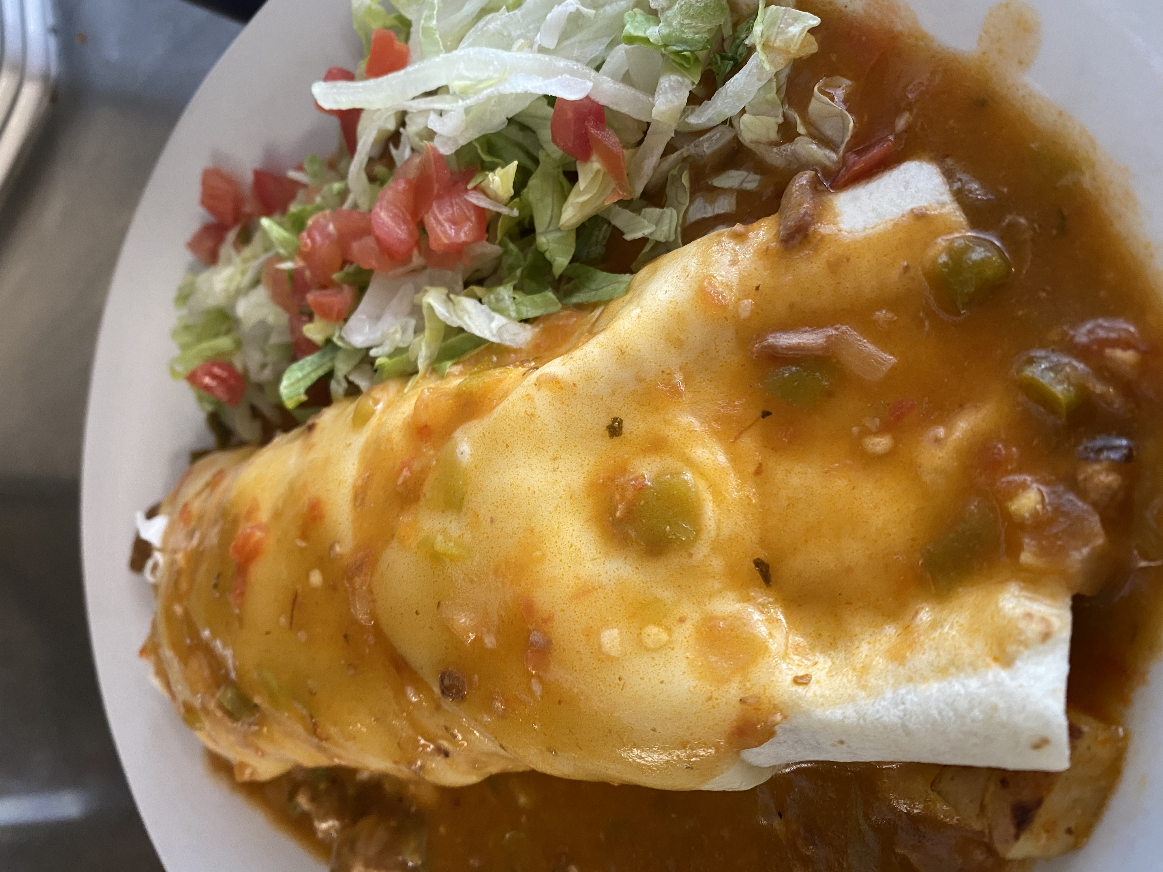Order The Cow Green Chili Burrito food online from The Cow / An Eatery store, Morrison on bringmethat.com