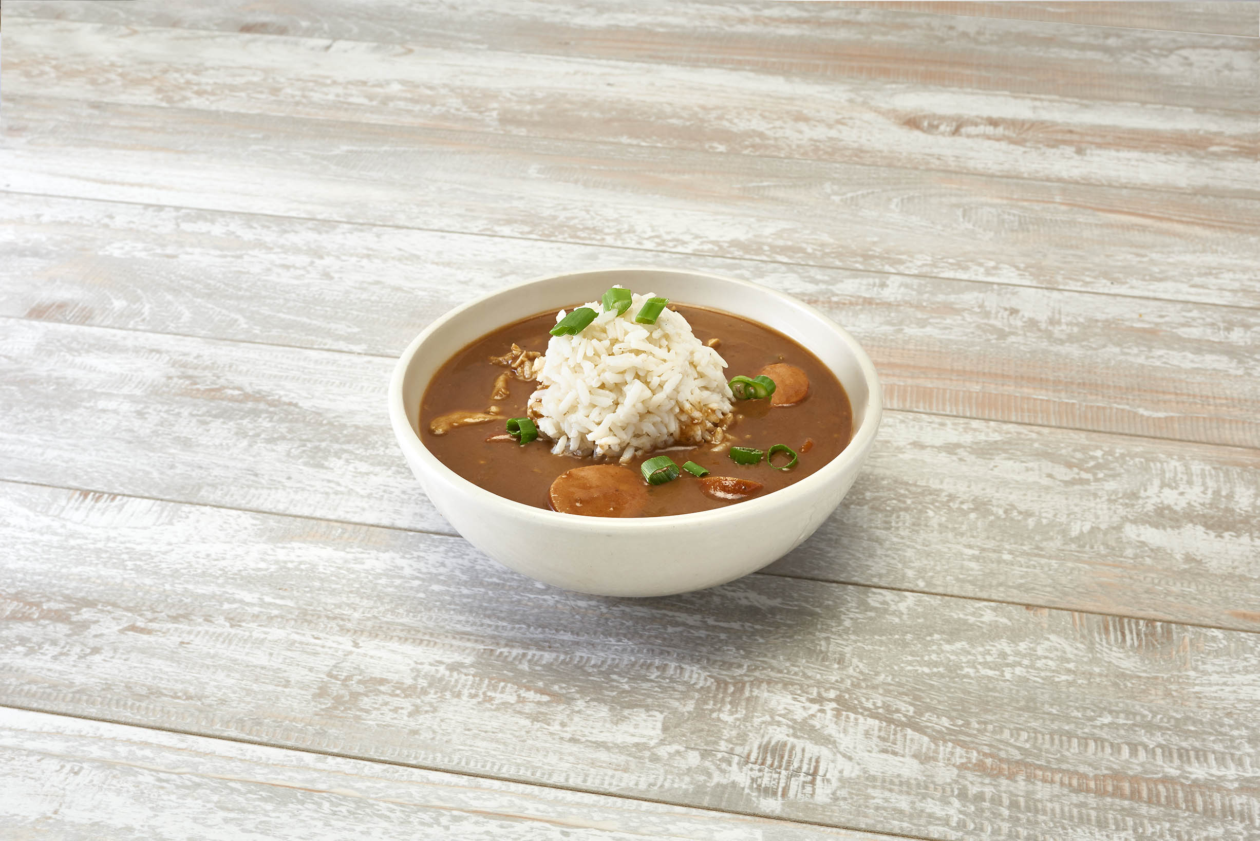 Order Smoked Sausage Gumbo Bowl food online from J. Gumbos store, Louisville on bringmethat.com