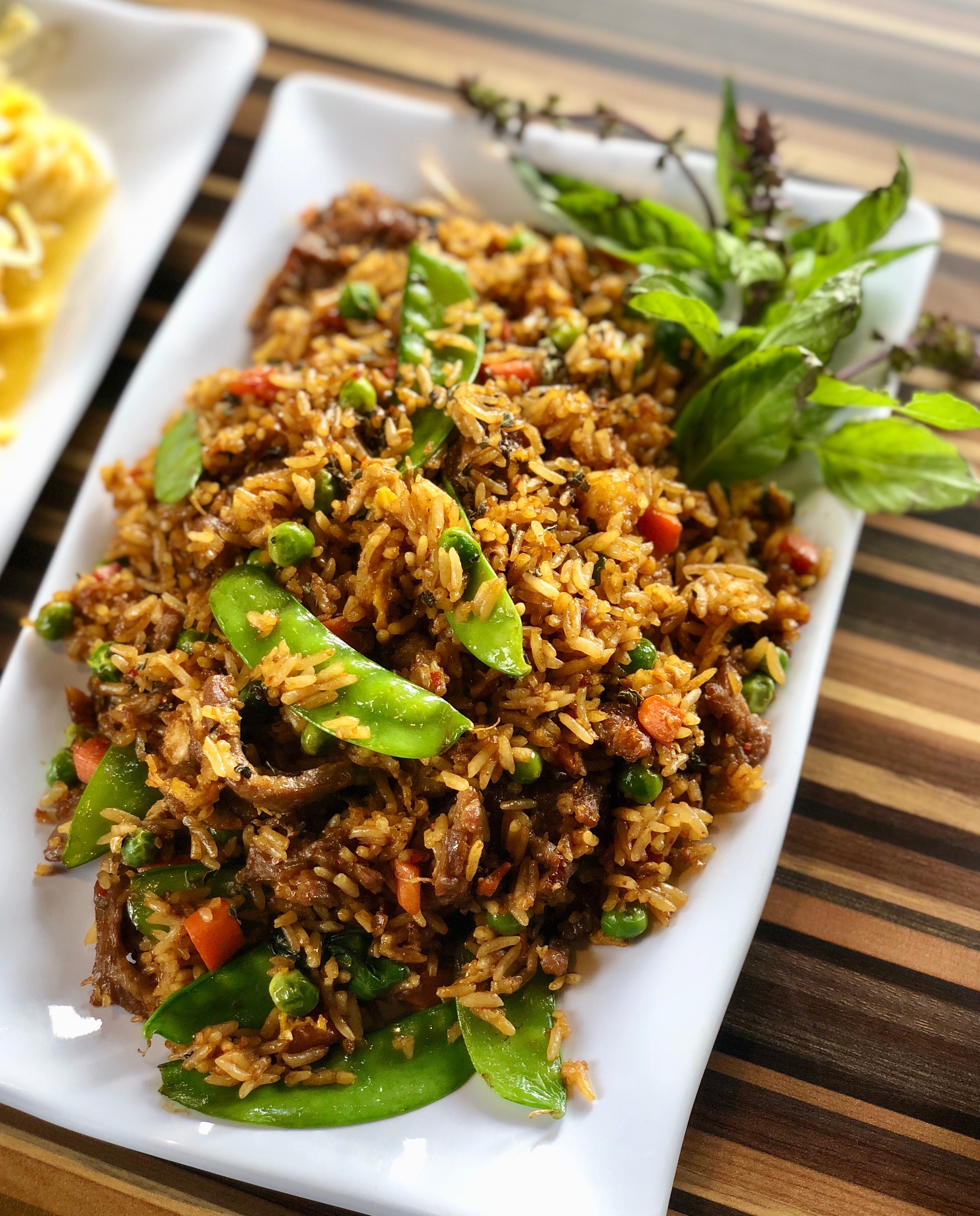Order FR4. Basil Fried Rice food online from Ahan Thai Restaurant store, Royal Oak on bringmethat.com