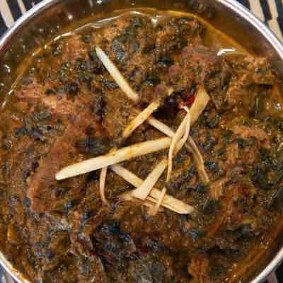 Order LAMB SAAG (83) food online from Kabob & Curry store, Providence on bringmethat.com