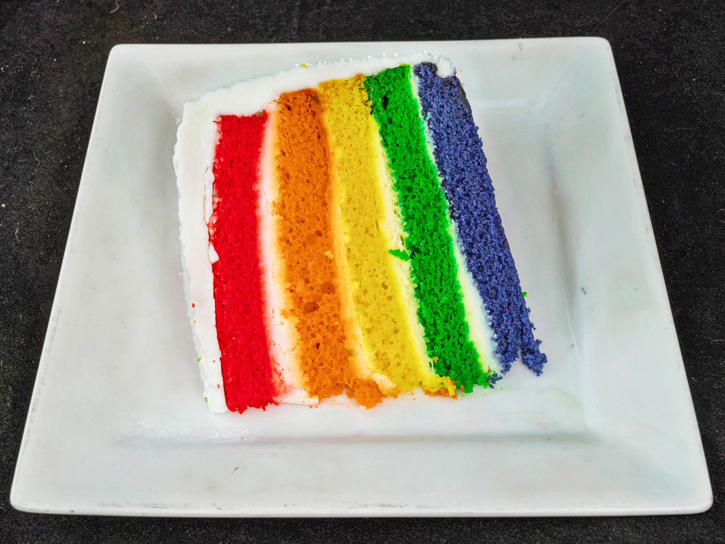Order Vanilla Rainbow Cake food online from Bravo NY Pizza store, New Milford on bringmethat.com