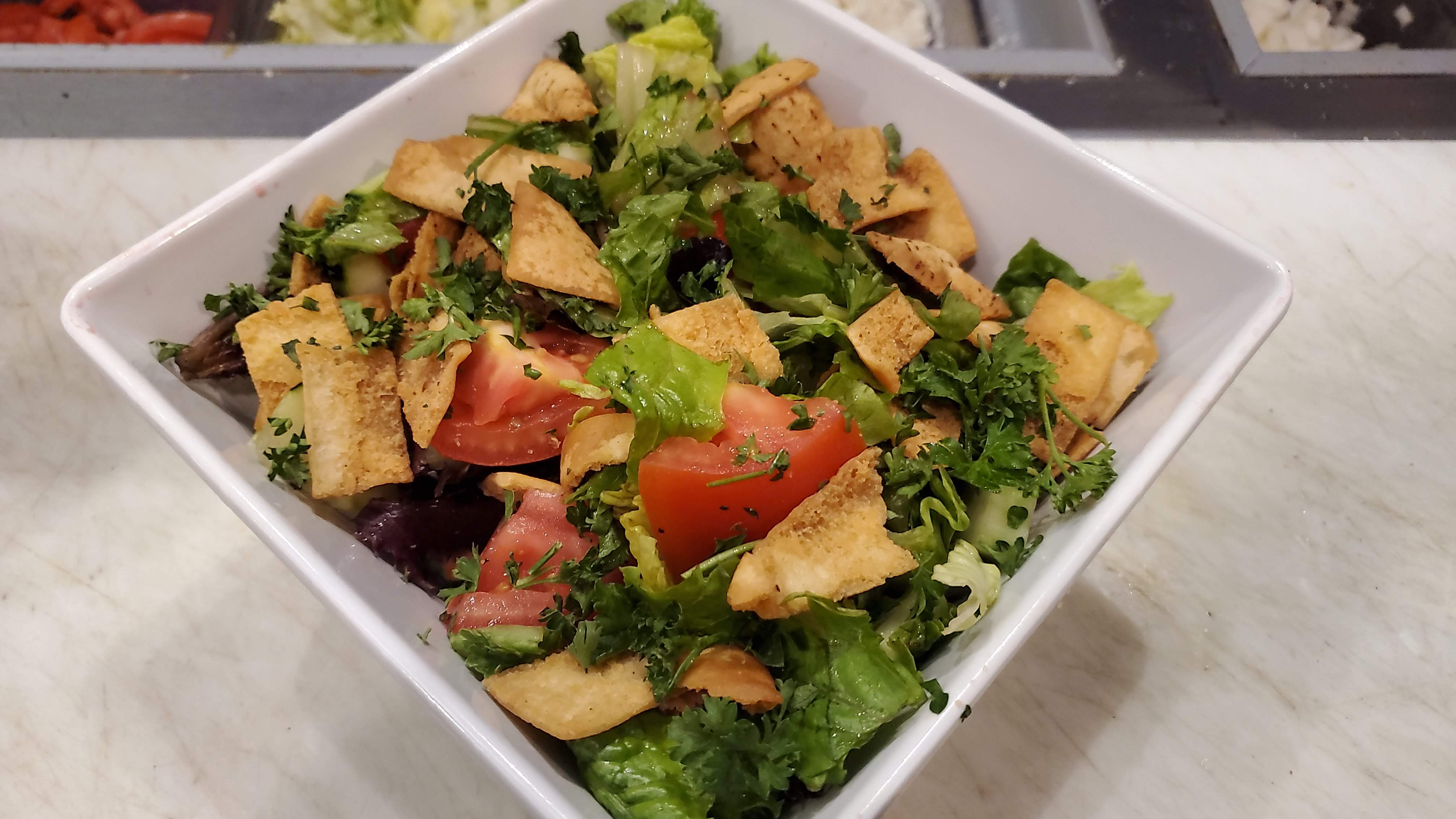 Order LG Fattoush Salad food online from Phoenicia Cafe store, Gilbert on bringmethat.com