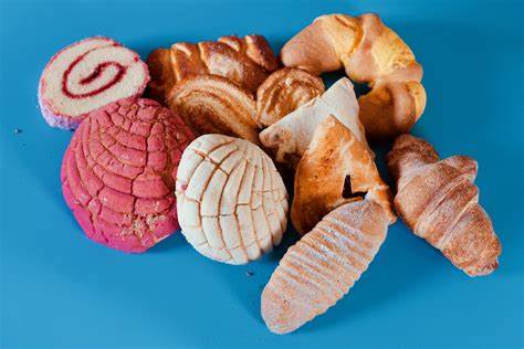 Order ONE DOZEN OF MIXED PAN DULCE (NOT AVAILABLE AFTER 12 NOON) food online from La Mejor store, Farmersville on bringmethat.com