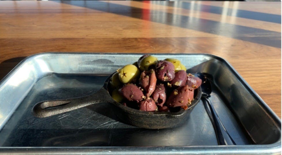 Order Warm Olives - Appetizer food online from Shorties Pizza + Grinders store, Austin on bringmethat.com