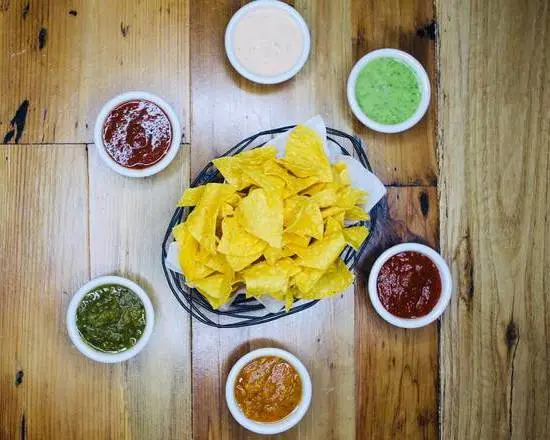 Order House Made Lime Tortilla Chips with Choice of 3 Salsas food online from Carlita store, Portland on bringmethat.com