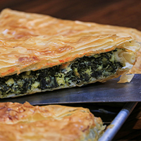 Order Spinach Pie (1/2 piece) food online from Silver Spoon Diner store, Queens on bringmethat.com
