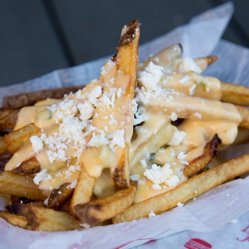 Order Queso Fries food online from The Burger Joint store, Houston on bringmethat.com