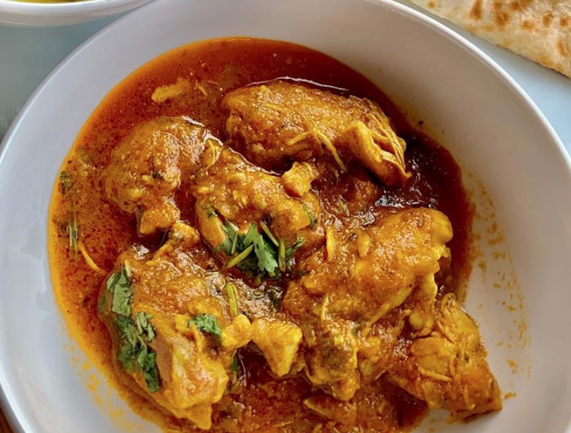 Order Chicken Curry food online from Manchurian Indian Cuisine store, West Sacramento on bringmethat.com
