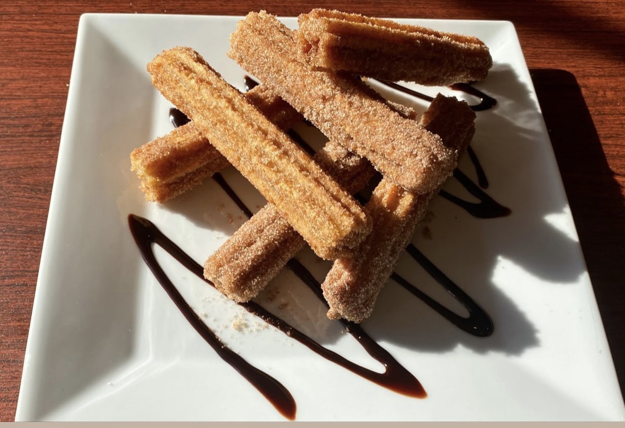 Order Churros (4) food online from Uncle's Pizza store, Norwalk on bringmethat.com
