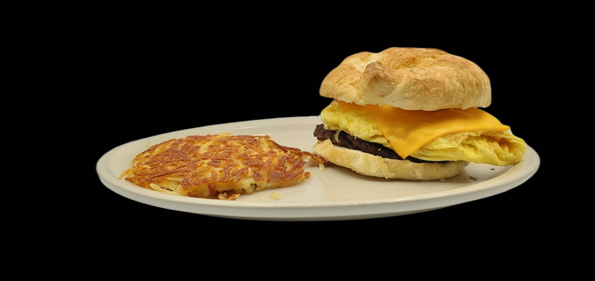 Order Sausage & Egg Croissant Sand food online from WePancakes store, Midwest City on bringmethat.com