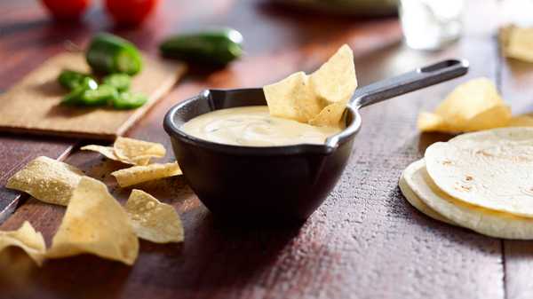 Order Queso food online from Salsarita's store, Concord on bringmethat.com