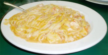 Order Fettuccine Seafood - Entree food online from Primas Pasta & Pizza Restaurant store, Fort Worth on bringmethat.com
