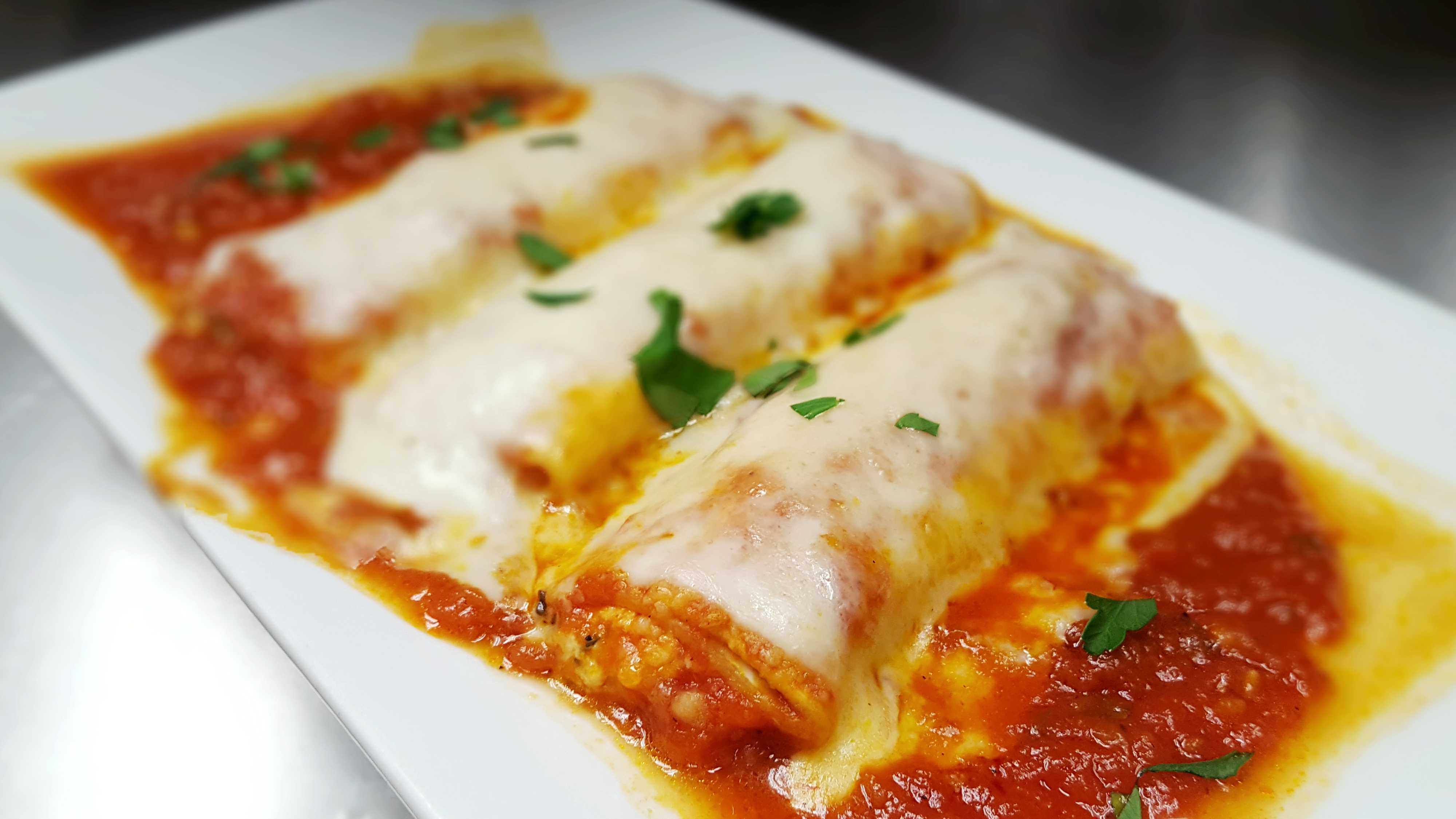 Order Manicotti food online from Marios Pizza Center & Restaurant store, Middlesex on bringmethat.com