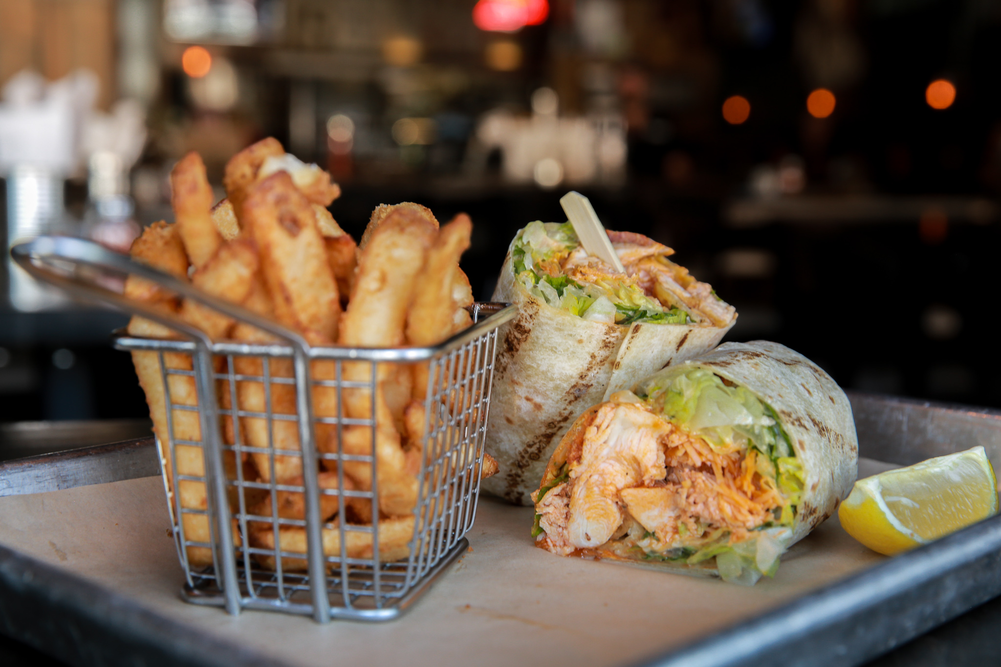 Order Buffalo Chicken Caesar Wrap food online from Sd Taproom store, San Diego on bringmethat.com