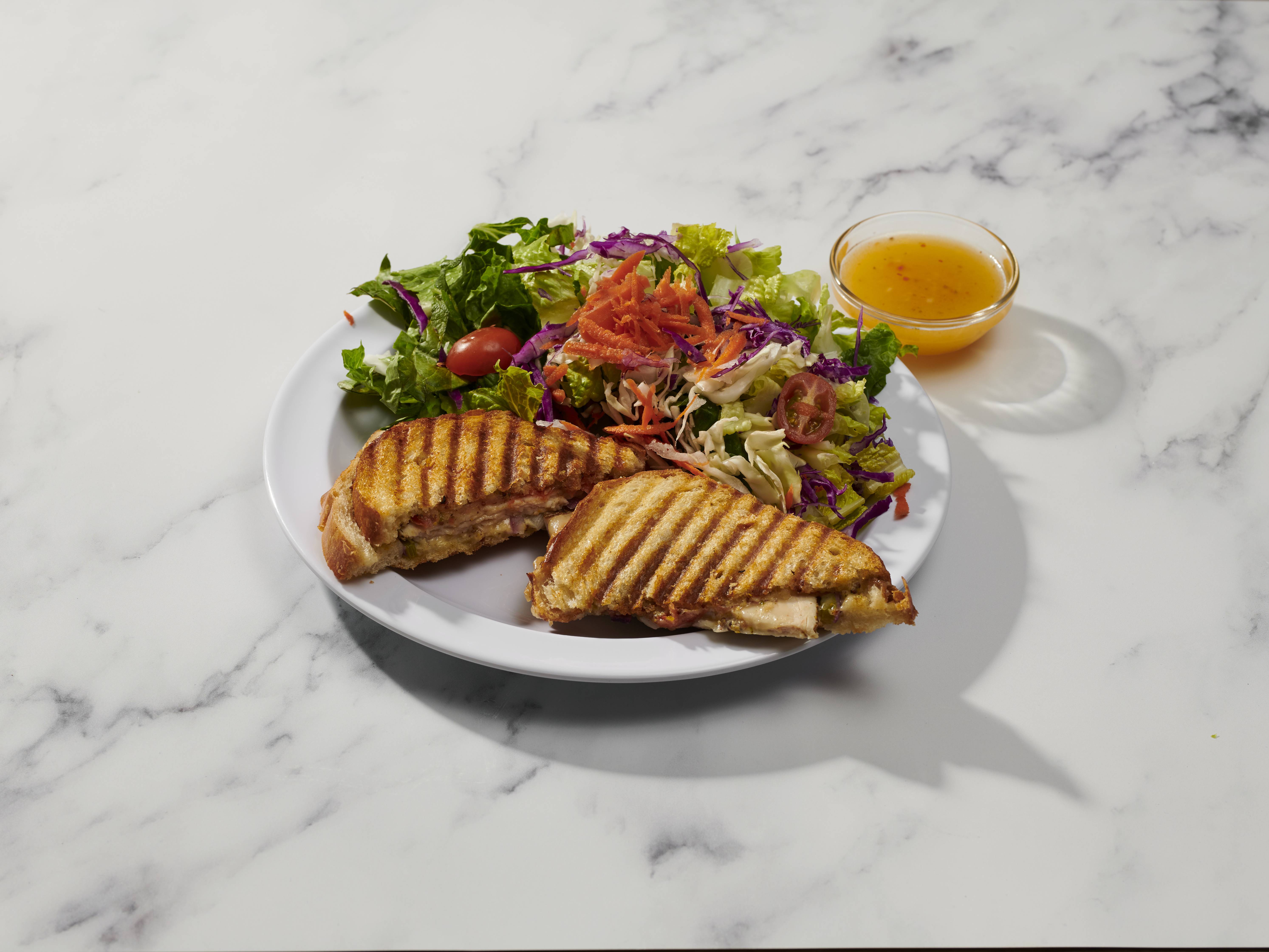 Order Turkey Panini food online from Zooza Cafe store, Thousand Oaks on bringmethat.com