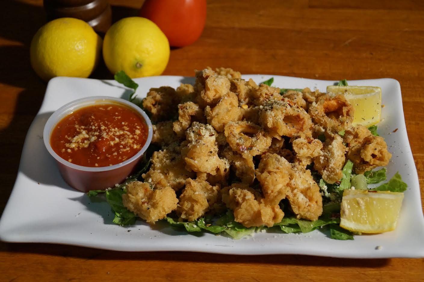 Order Fried Calamari food online from Pizza Lounge store, Houston on bringmethat.com