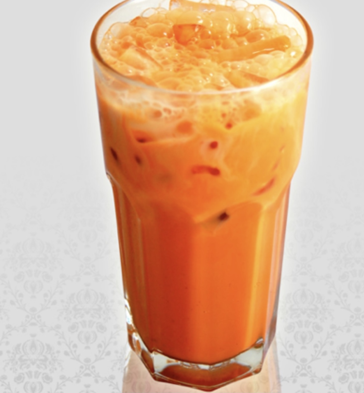 Order 16 oz. Thai Iced Tea food online from Thai Delight store, Norman on bringmethat.com