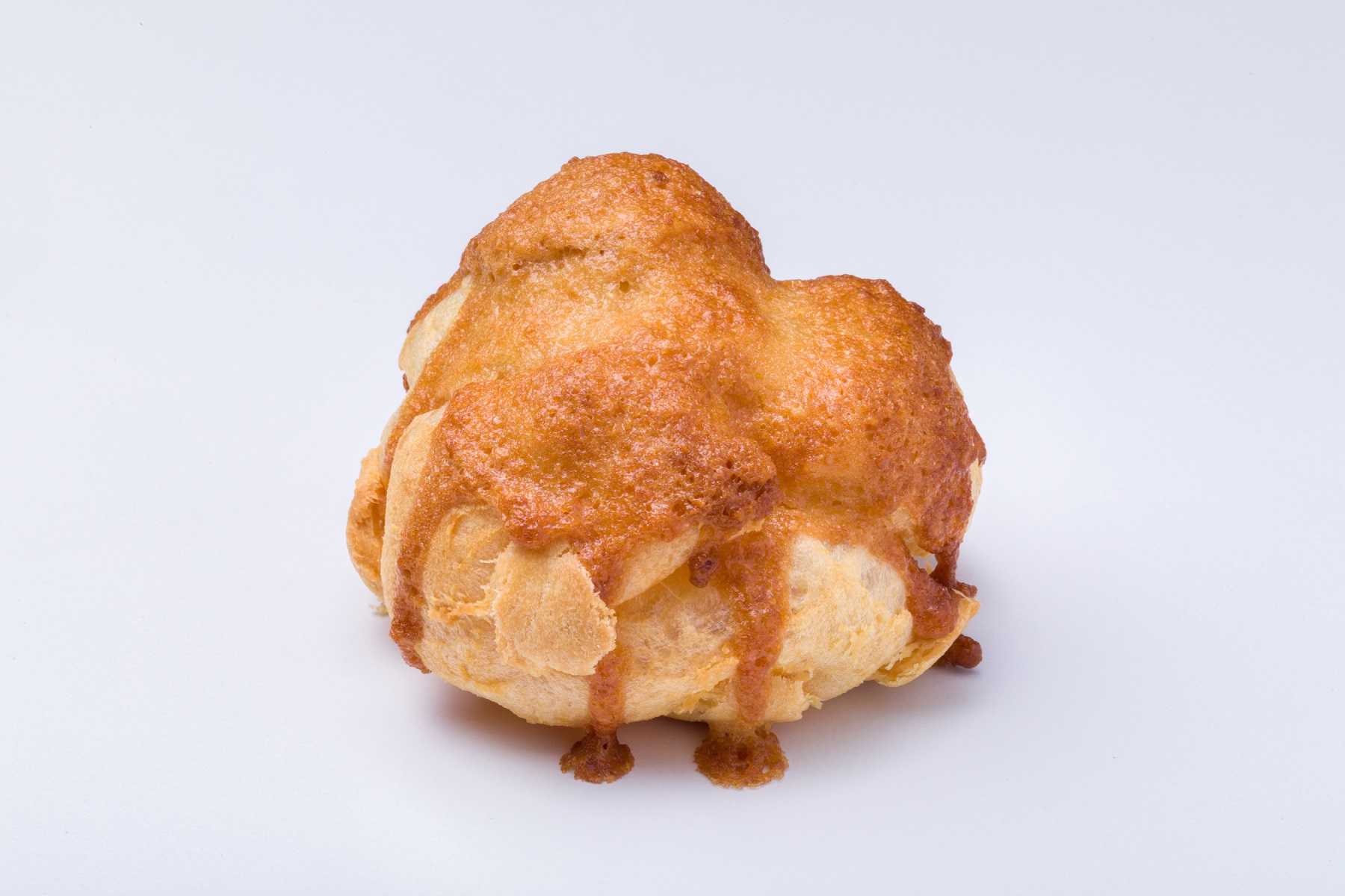 Order Honey & Butter Cream Puff food online from Beard Papa store, Norcross on bringmethat.com