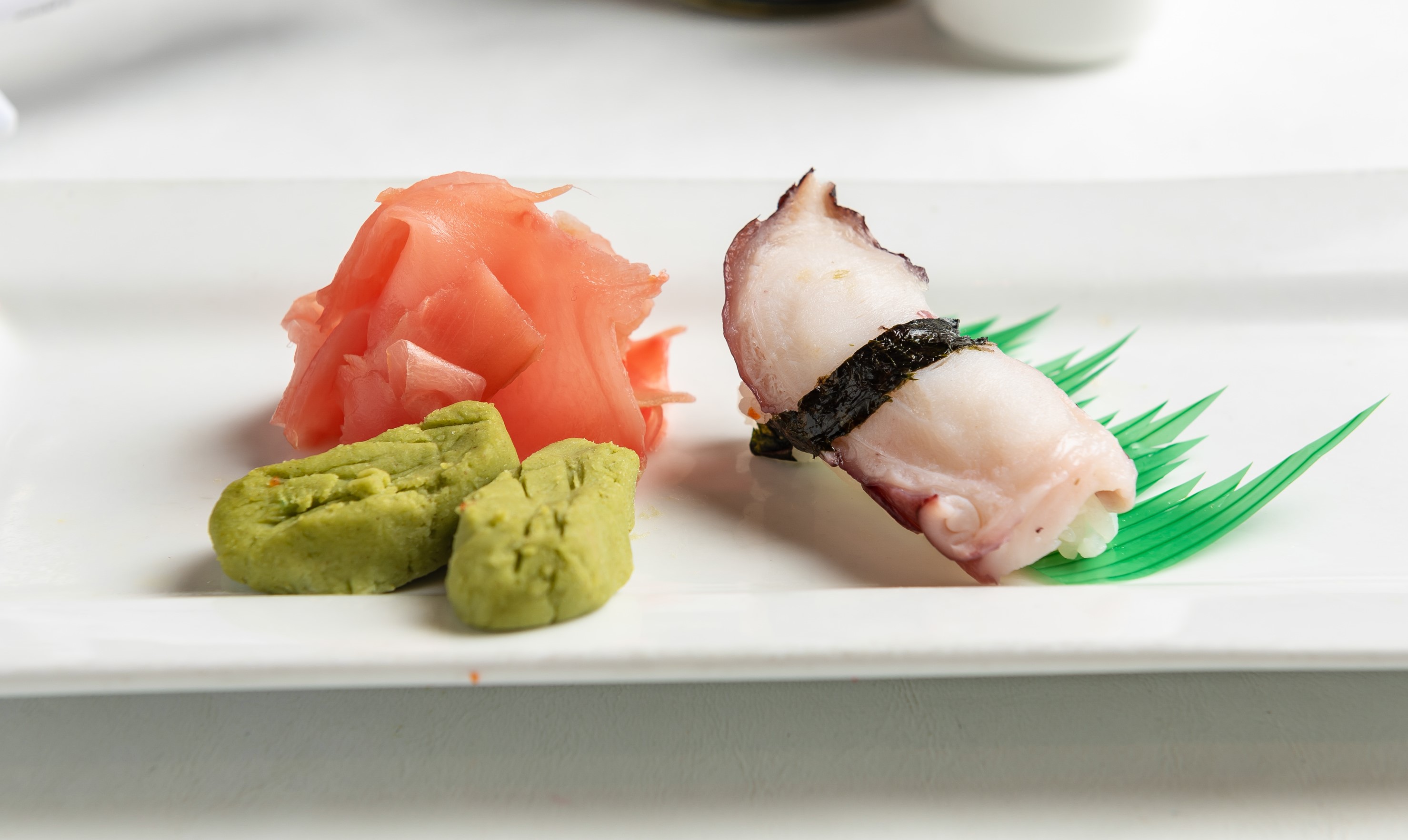 Order Tako Nigiri food online from Phuket Thai Restaurant and Sushi store, Huntsville on bringmethat.com
