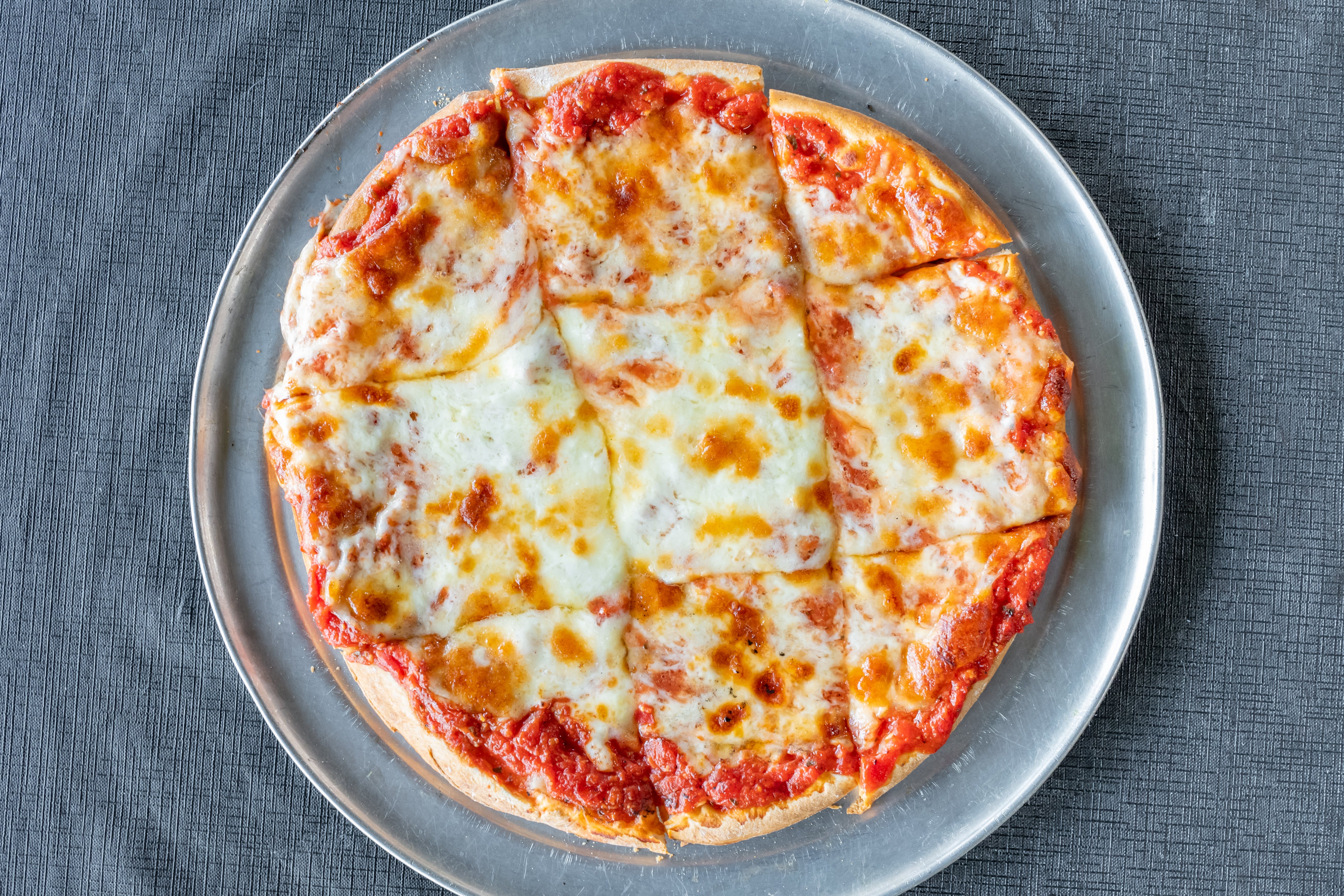 Order Cheese Pizza - 14" food online from Luigi's Italian Restaurant  store, Fort Worth on bringmethat.com
