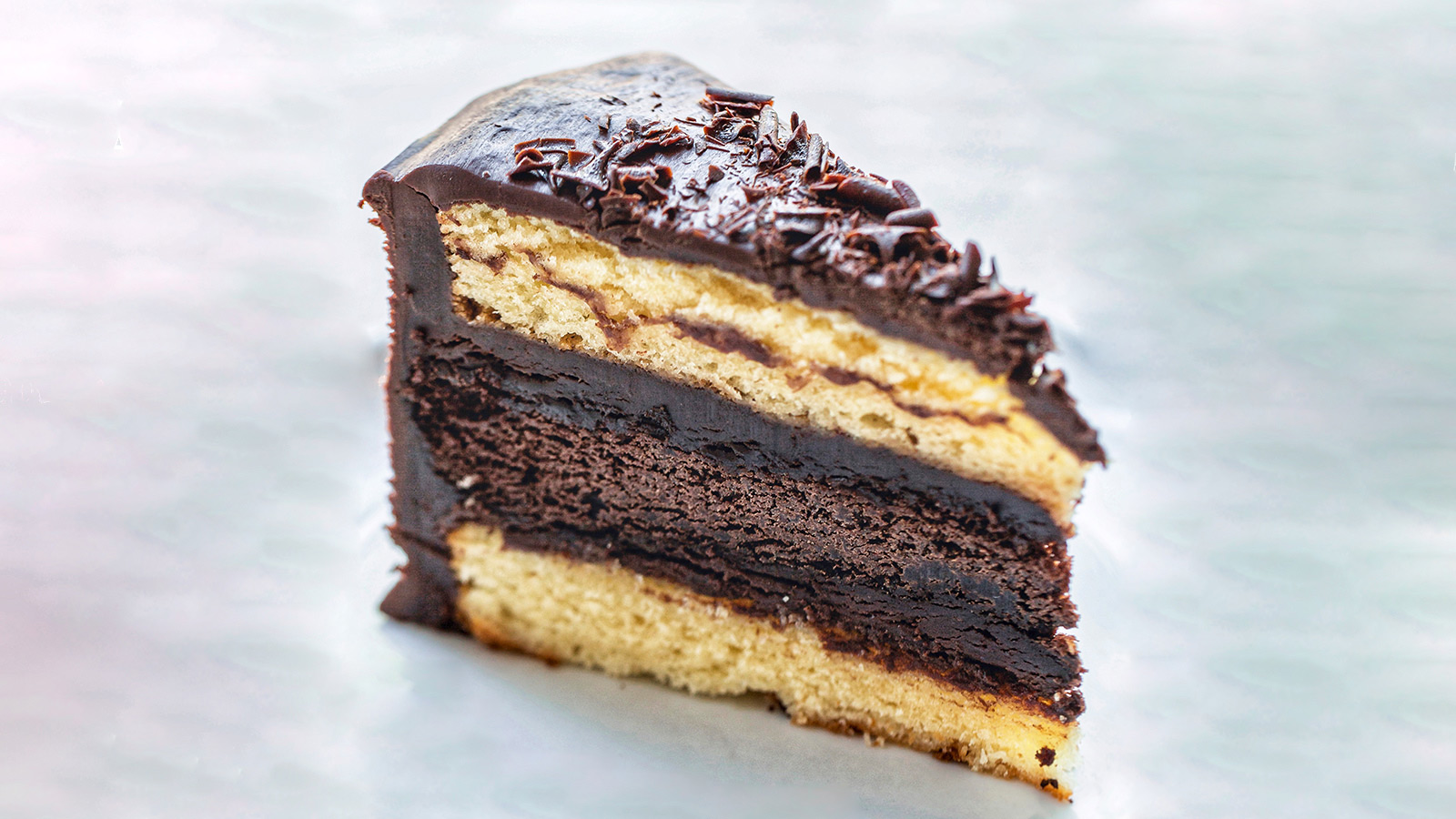 Order CHOCOLATE TUXEDO CAKE food online from Freddie Parker's Pasta Shop store, Vacaville on bringmethat.com