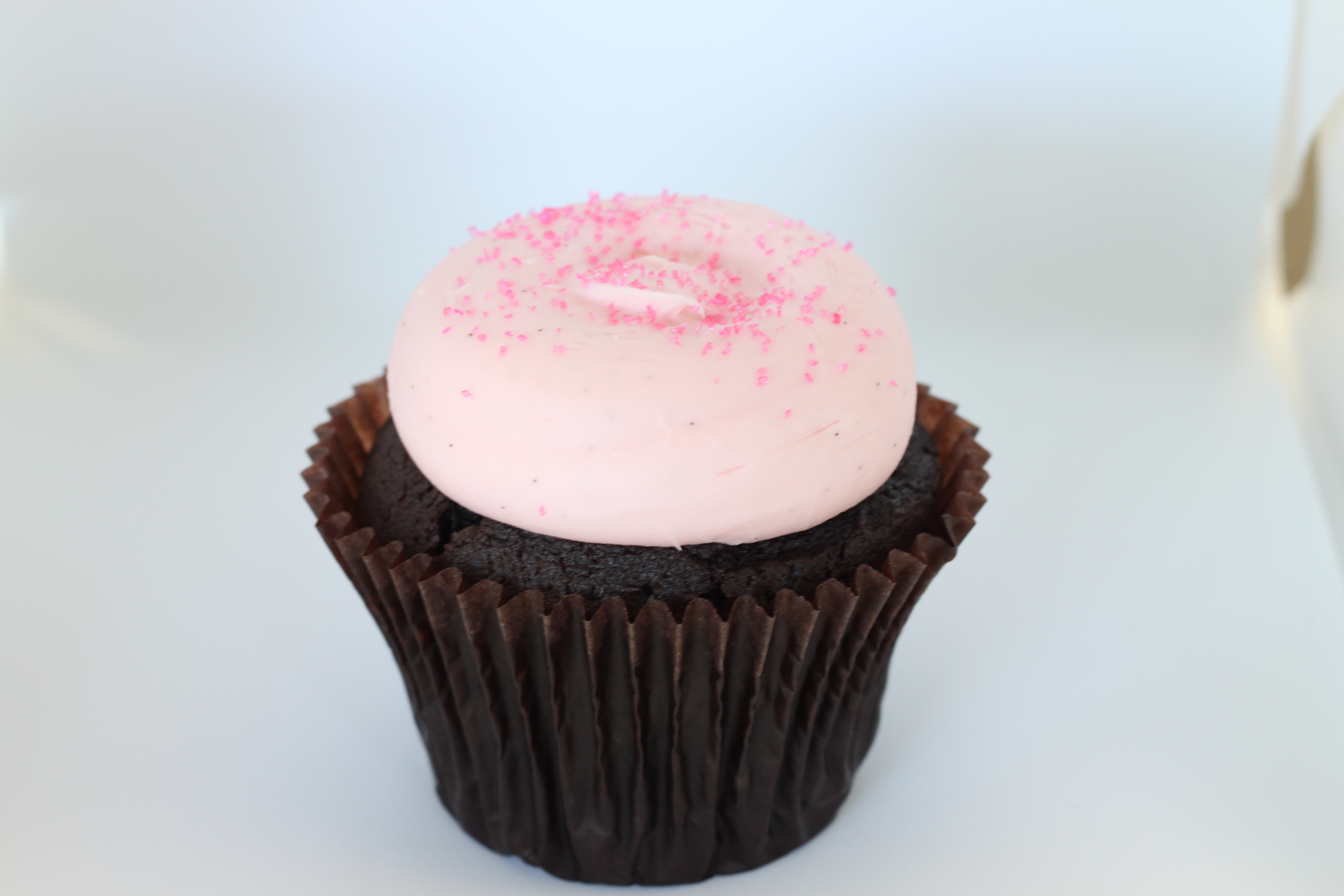 Order Pink Chocolate Cupcake food online from Smallcakes Cupcakery And Creamery store, Garhanna on bringmethat.com