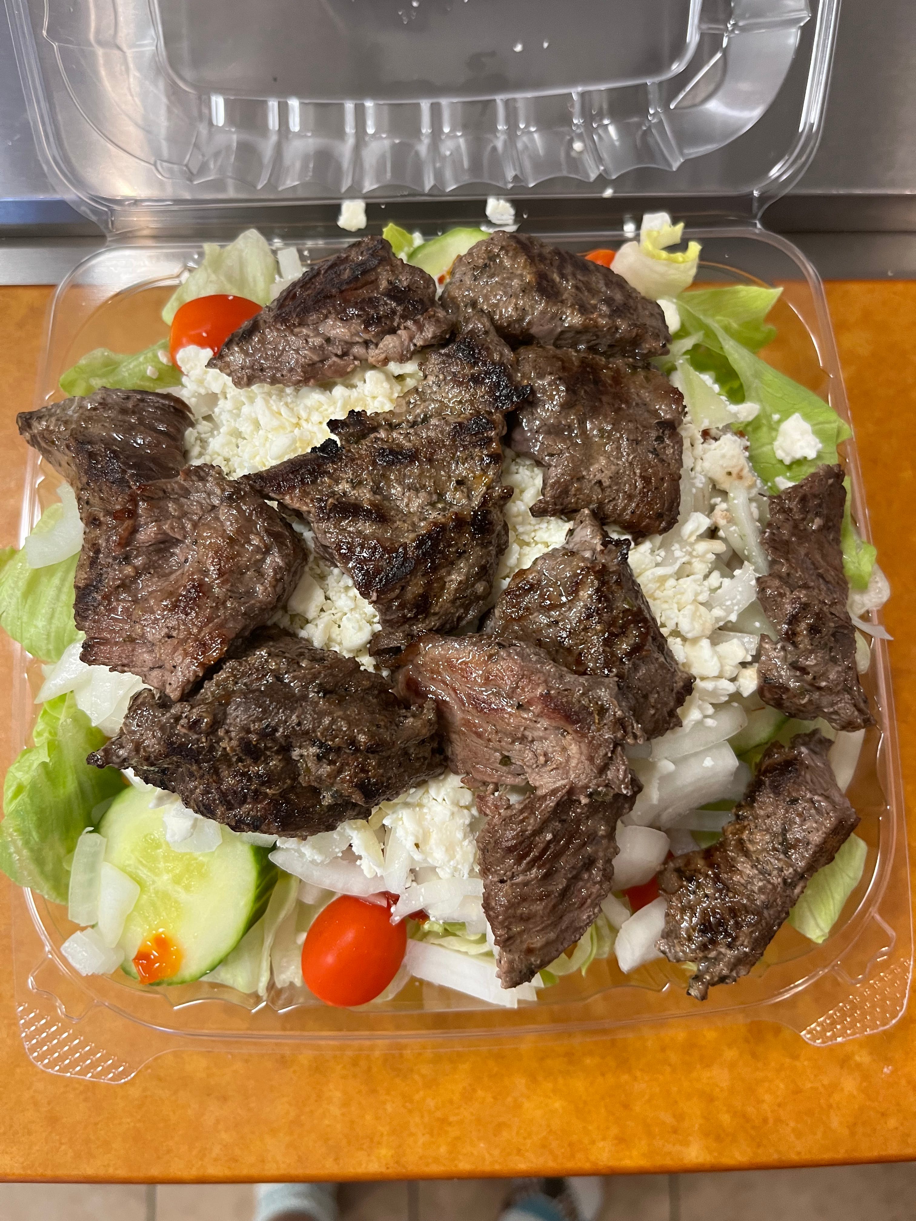 Order Greek Steak Tip Salad with Feta - Salad food online from Phillip's Roast Beef & Pizza store, Rowley on bringmethat.com
