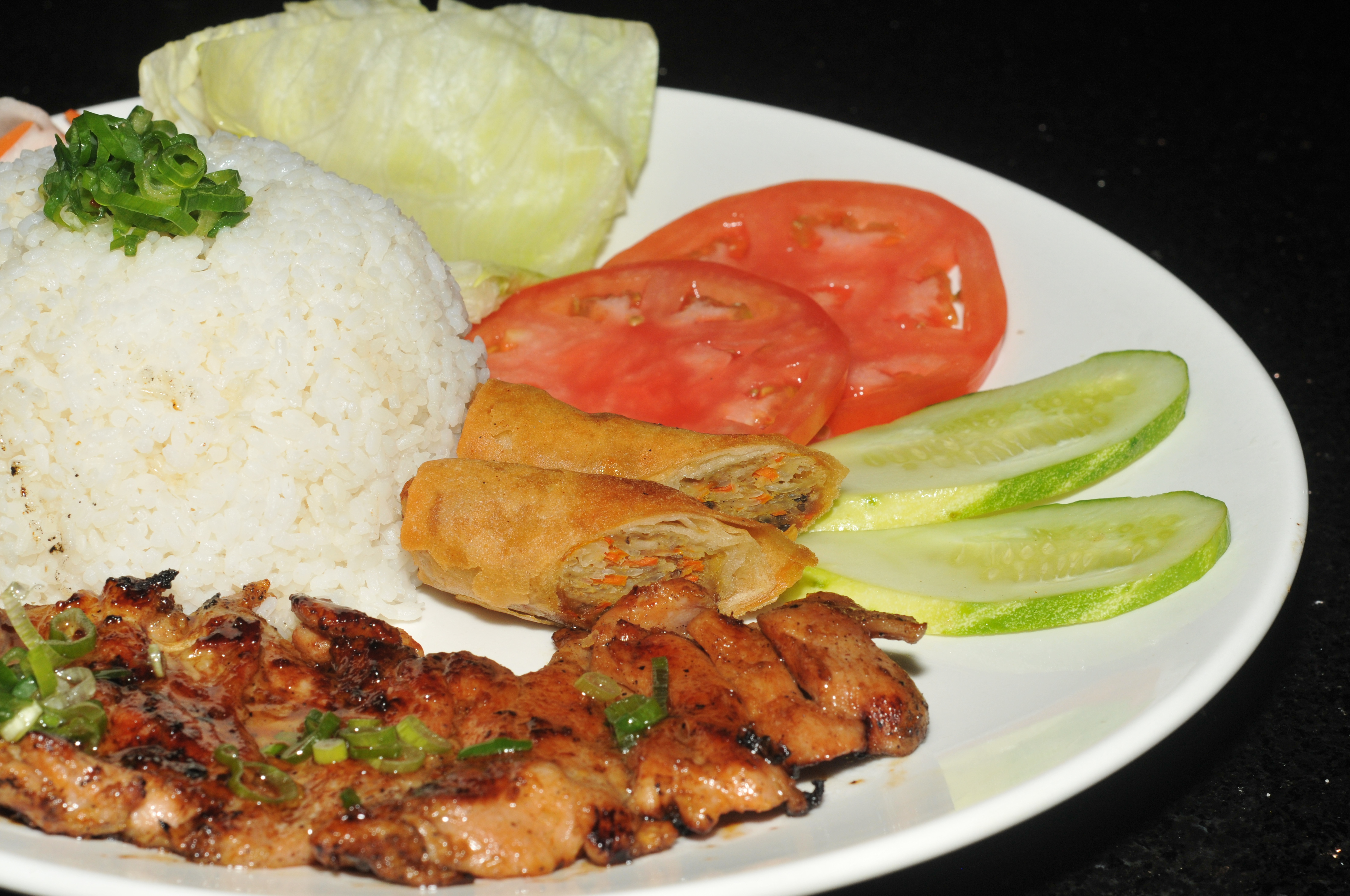 Order 104. Com Ga Nuong/Grilled chicken with rice. food online from Pho Bistro store, Malden on bringmethat.com