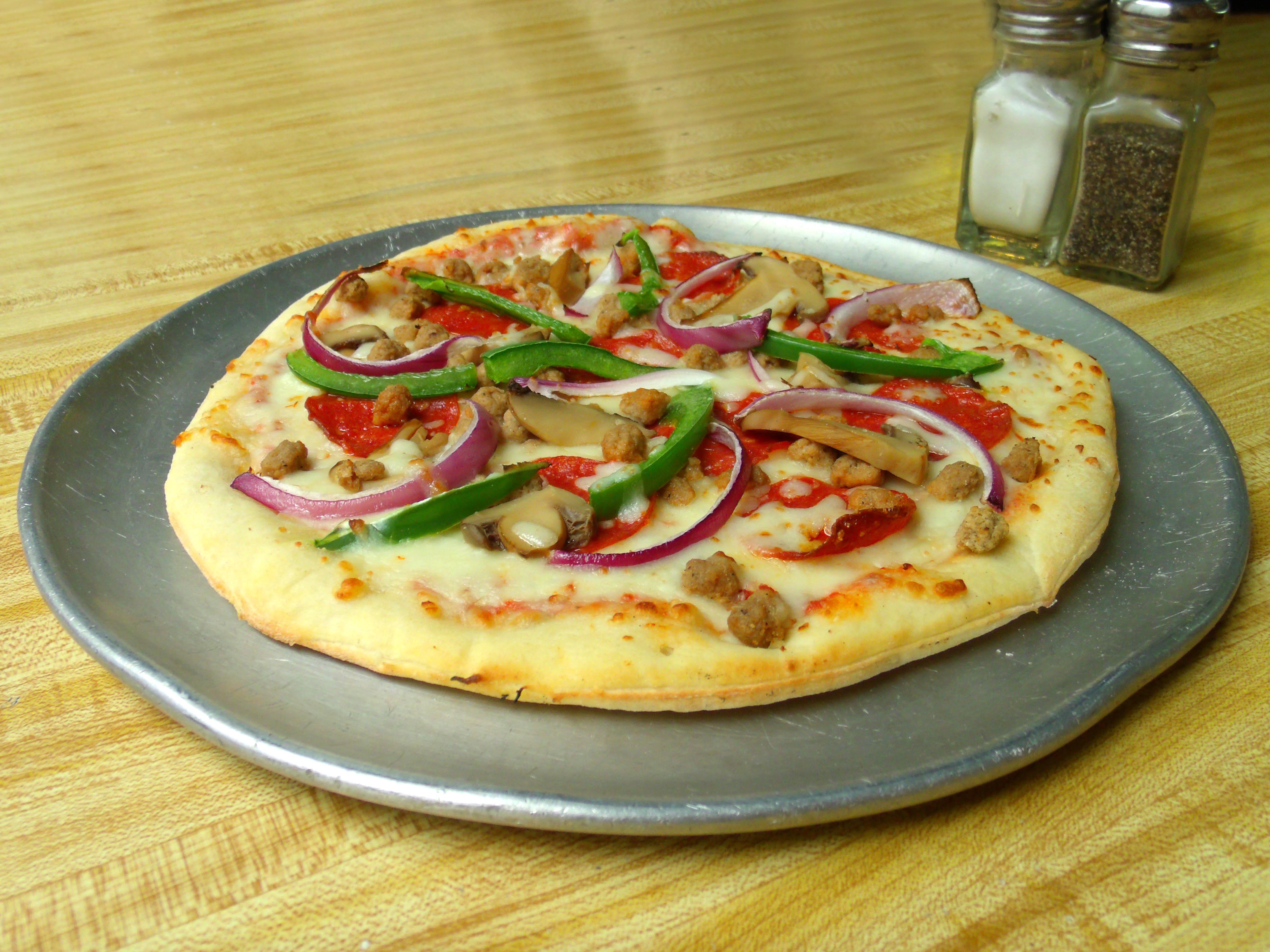 Order Supreme Pizza food online from Papa's Pizza store, New Orleans on bringmethat.com