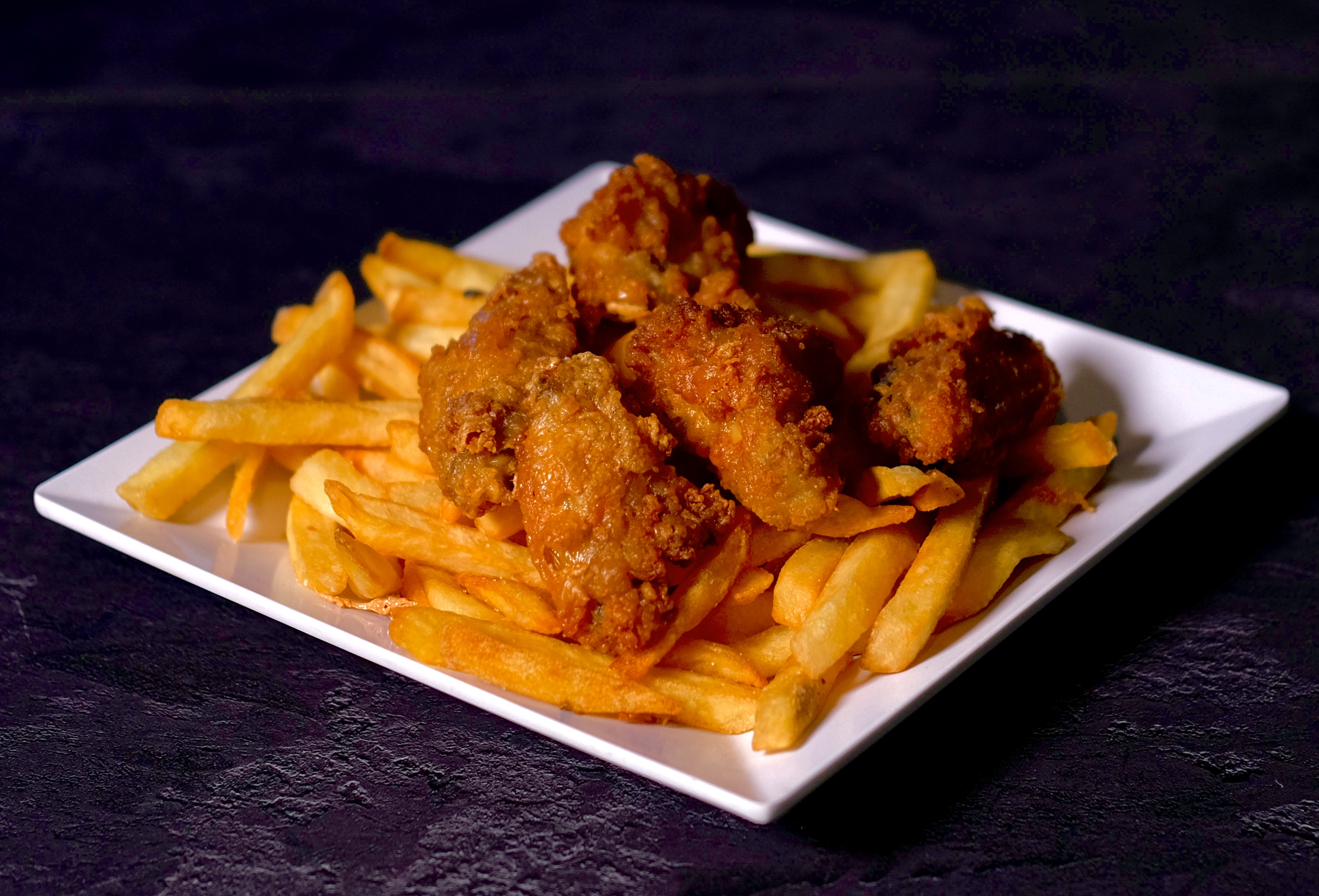 Order 4 Piece Buffalo Chicken with Fries Combo food online from Time Tequila Bar Cafe store, Glendale on bringmethat.com