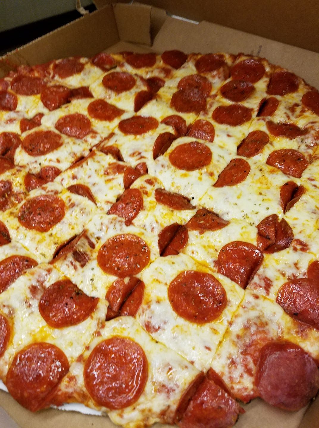 Order One Topping Pizza - Small 12" food online from Saucy Sisters Pizzeria store, Leesburg on bringmethat.com