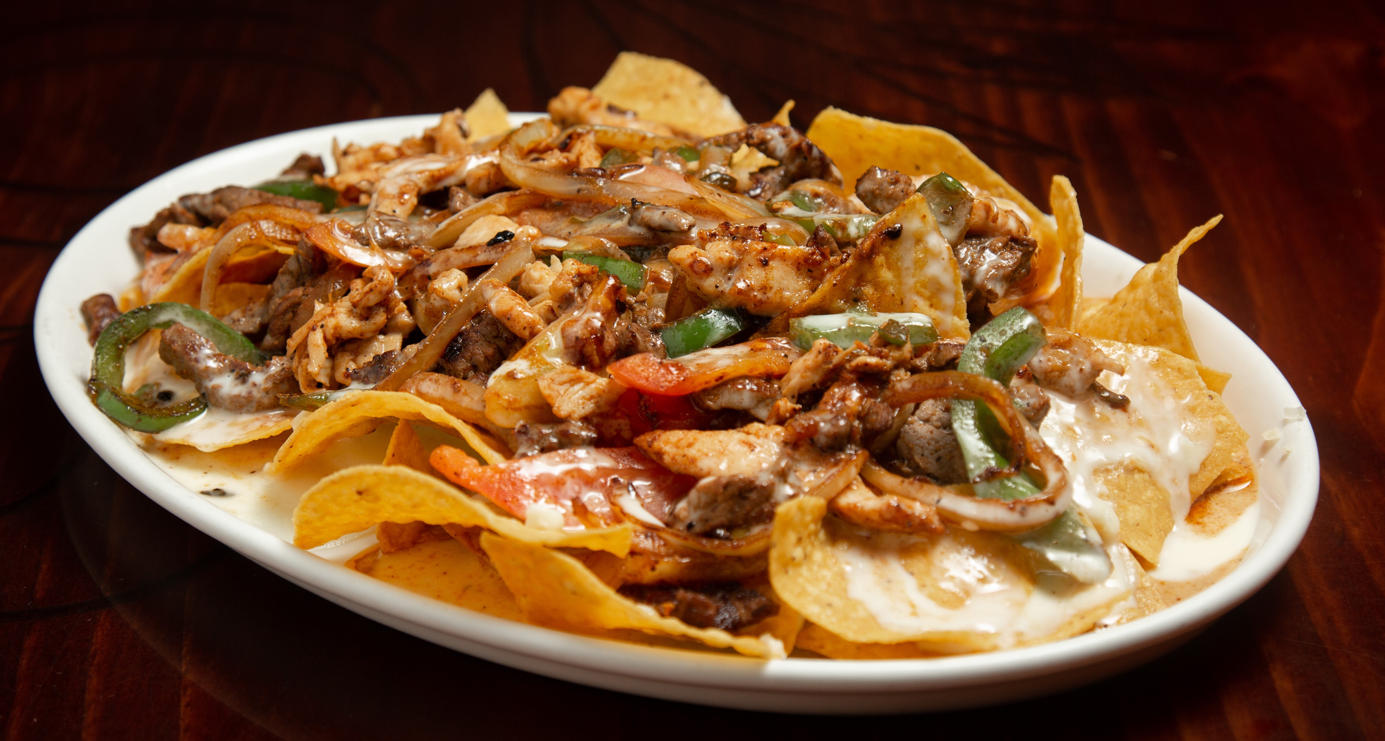 Order Fajita Nachos food online from Tito Mexican Restaurant store, Spring Hill on bringmethat.com