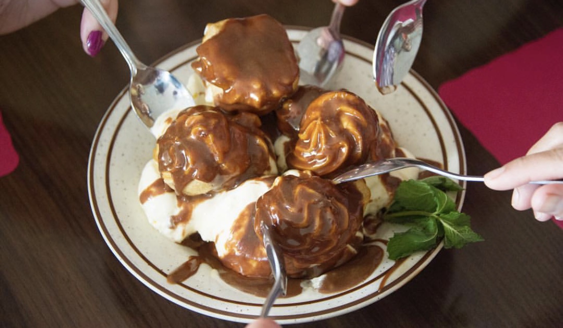 Order Profiteroles with Homemade Caramel Fudge food online from The Tulsa Rib Company & Catering store, Orange on bringmethat.com