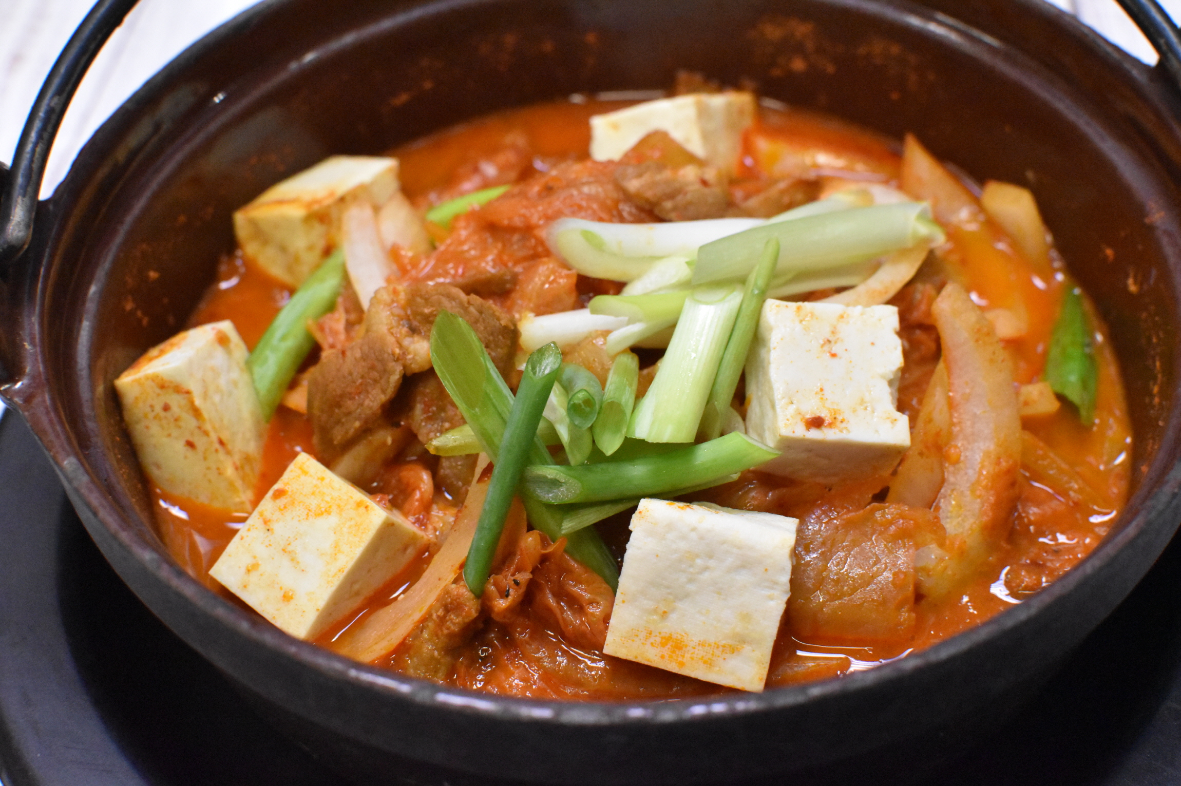 Order Kimchi Stew Soup food online from Umi Sushi store, Ann Arbor on bringmethat.com