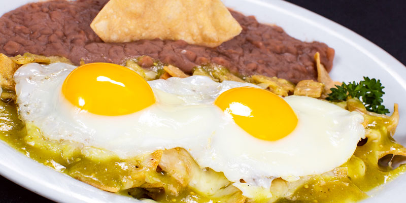 Order Chilaquiles Suizos - Chicken food online from Danny Restaurant store, Laredo on bringmethat.com