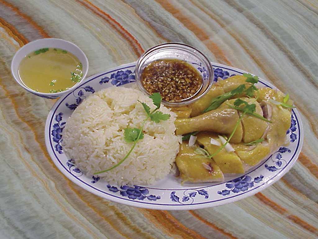 Order 803. Hainan Chicken over Rice Plate food online from San Sun store, San Francisco on bringmethat.com