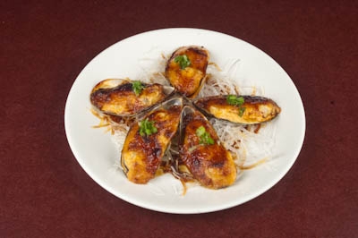 Order MUSSELS DYNAMITE food online from Sushi Zushi store, San Antonio on bringmethat.com