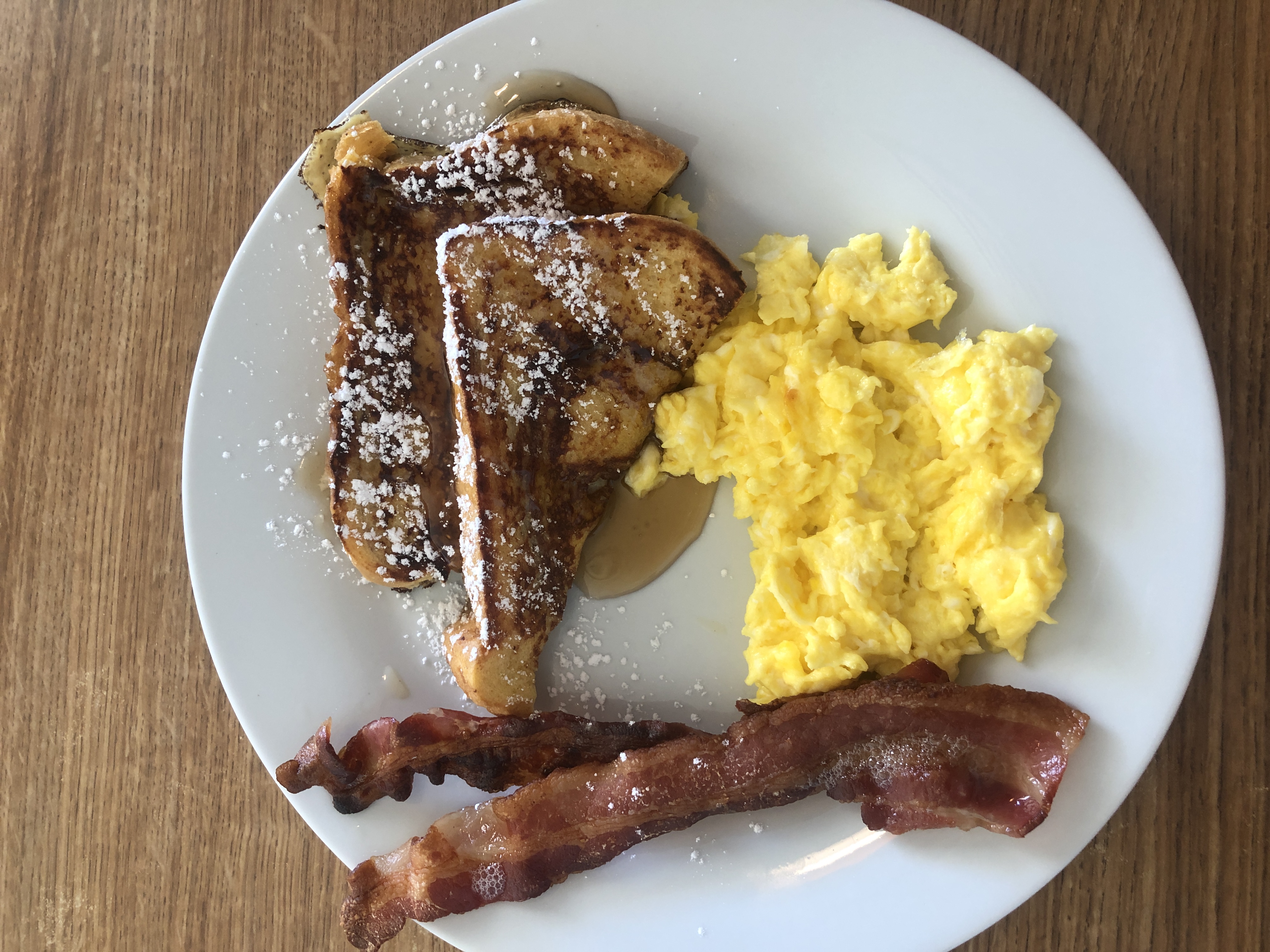 Order 1/2 French Toast with Bacon and Eggs food online from Karen Cafe store, Palm Desert on bringmethat.com
