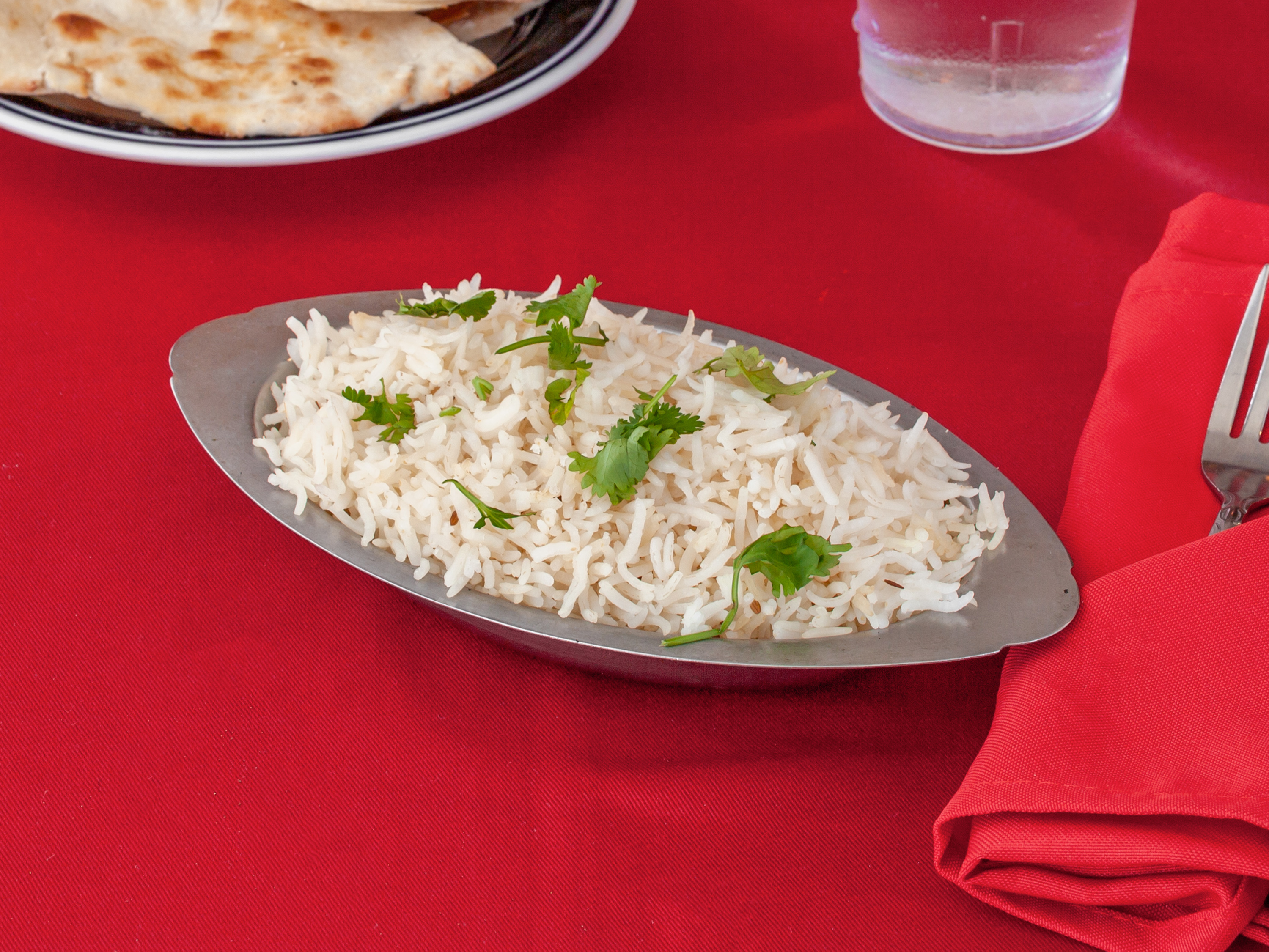 Order 33. White Rice food online from Ambar Indian Restaurant store, Champaign on bringmethat.com