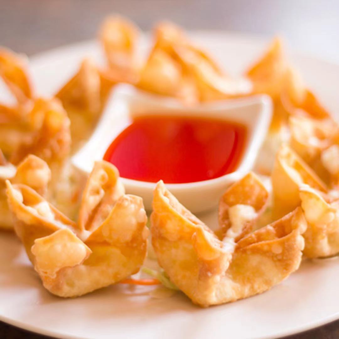 Order 4. Cheese Crab Rangoon 蟹角 food online from China Garden store, Indianapolis on bringmethat.com