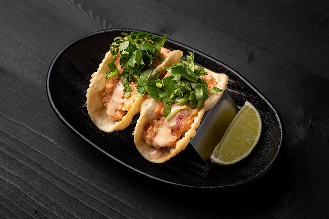 Order Spicy Tuna Tacos* (2 pcs) food online from JINYA Ramen Bar store, Henderson on bringmethat.com