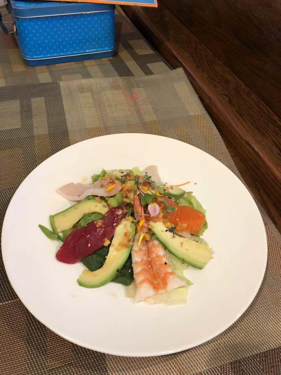 Order 9.Ocen avocado salad food online from Izu Sushi Asian fusion store, Lansdale on bringmethat.com