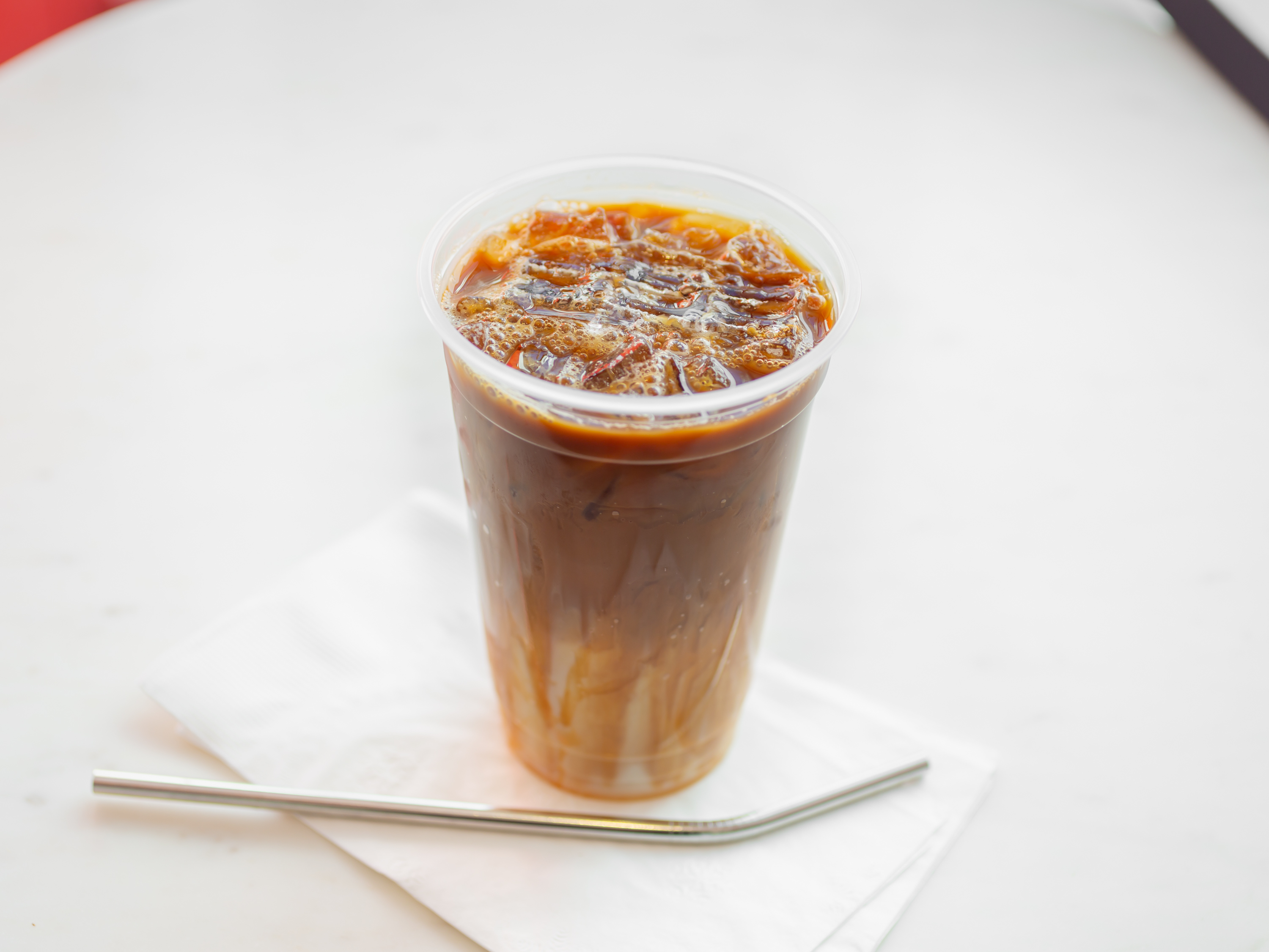Order Iced Caramel Macchiato food online from Eclair & Café store, Torrance on bringmethat.com