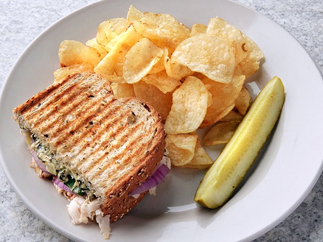 Order Chicken Spinach Artichoke Panini food online from Daily Dose Cafe and Espresso store, Minneapolis on bringmethat.com