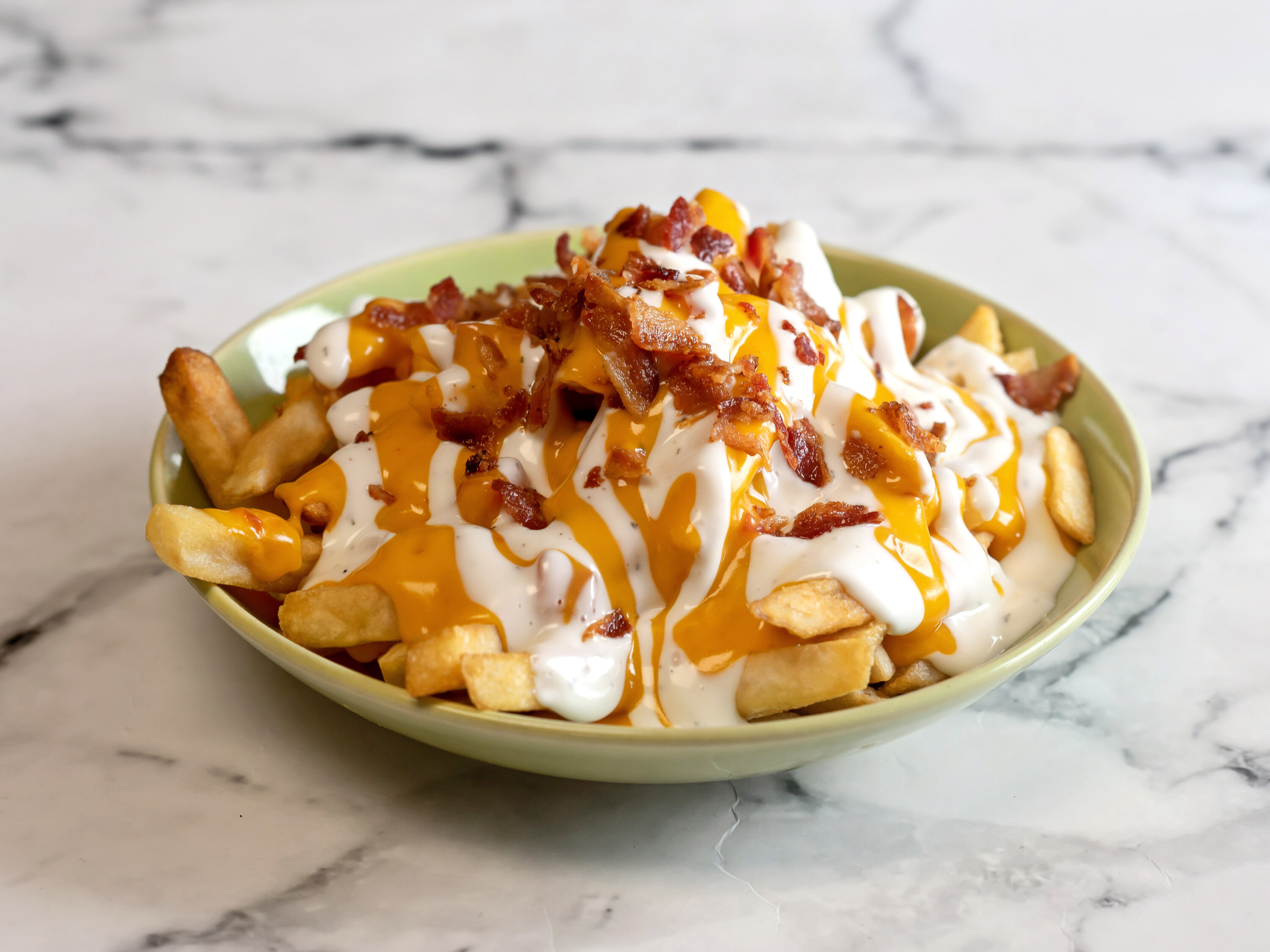 Order Side of Loaded fries food online from Bubbas store, Lorain on bringmethat.com